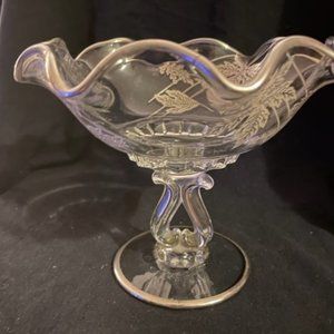 Vintage crystal scalloped silver leaf overlay and rim stemmed candy dish.  GUC